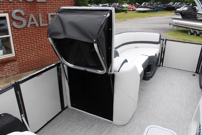 Slide: The Image of 2025 Tahoe Pontoon Cascade Quad Lounger with sleek seating and modern design. - 13
