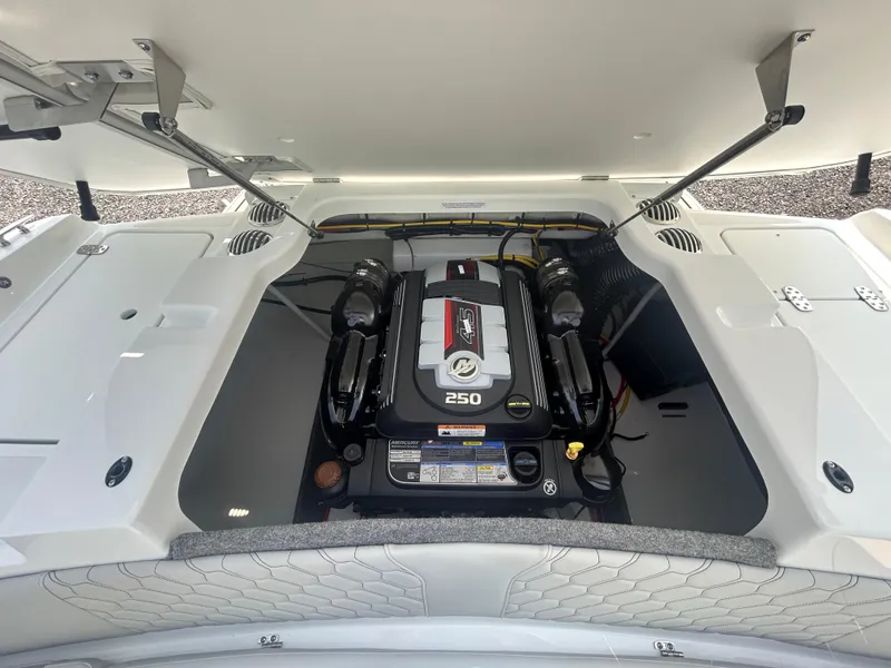 Slide: The Image of 2026 Four Winns H2 Freedom boat engine compartment with 250 horsepower engine. - 15
