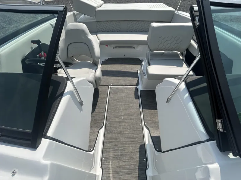 Slide: The Image of 2026 Four Winns H2 Freedom boat interior with modern seating and sleek design. - 7