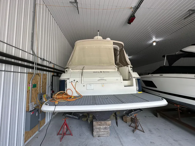 Slide: The Image of 2004 Regal Commodore 3860 yacht stored indoors on supports. - 2
