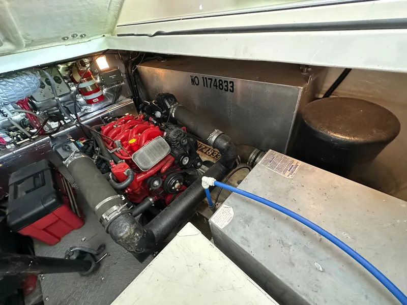 Slide: The Image of Engine compartment of 2004 Regal Commodore 3860 with visible components and wiring. - 27