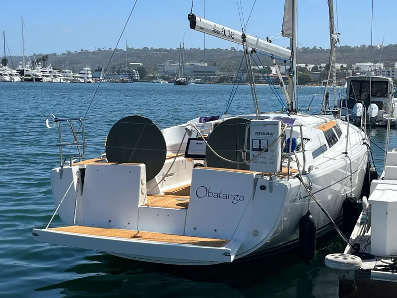 Slide: The Image of 2014 Hanse 345 sailboat docked in marina, sunny day, calm water. - 40