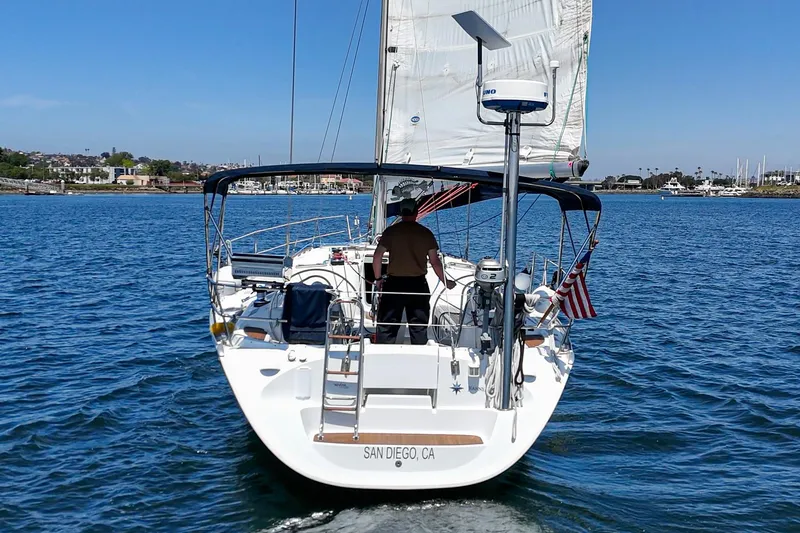 Slide: The Image of 2002 Jeanneau Sun Odyssey 43 sailing in San Diego waters, rear view. - 37