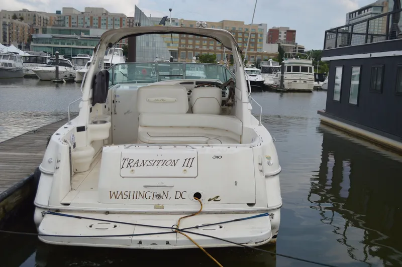 Slide: The Image of 1998 Sea Ray 310 Sundancer docked in a marina, Washington, D.C. - 10