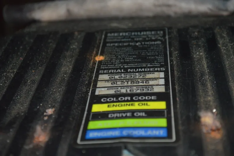 Slide: The Image of Label on a 1998 Sea Ray 310 Sundancer engine, showing serial numbers and color codes. - 38