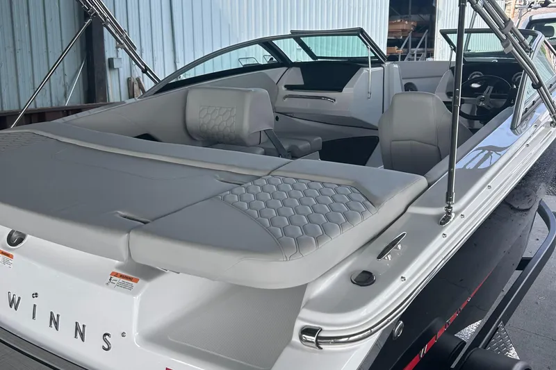Slide: The Image of 2025 Four Winns H1 boat interior with sleek seating and modern design. - 3