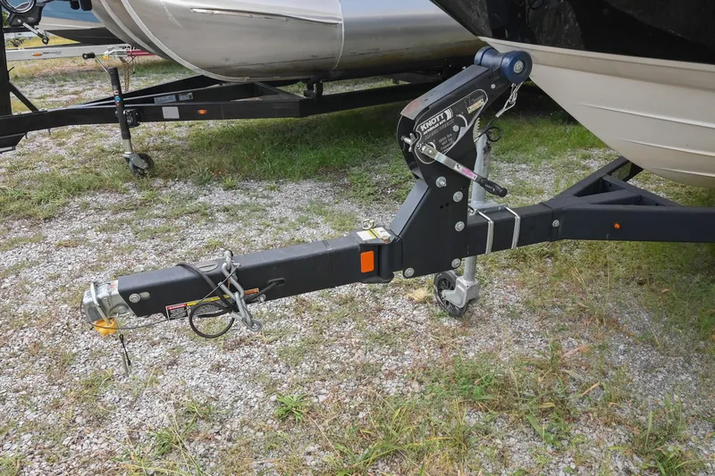 Slide: The Image of Trailer hitch of a 2018 Sea Ray SPX 210 Outboard on gravel surface. - 35