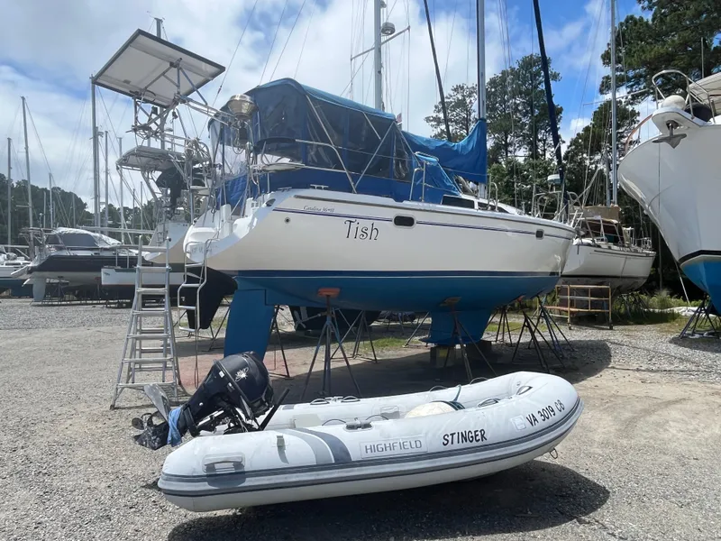 Slide: The Image of Catalina 36 Mk II sailboat on land with inflatable dinghy, 2000 model. - 2