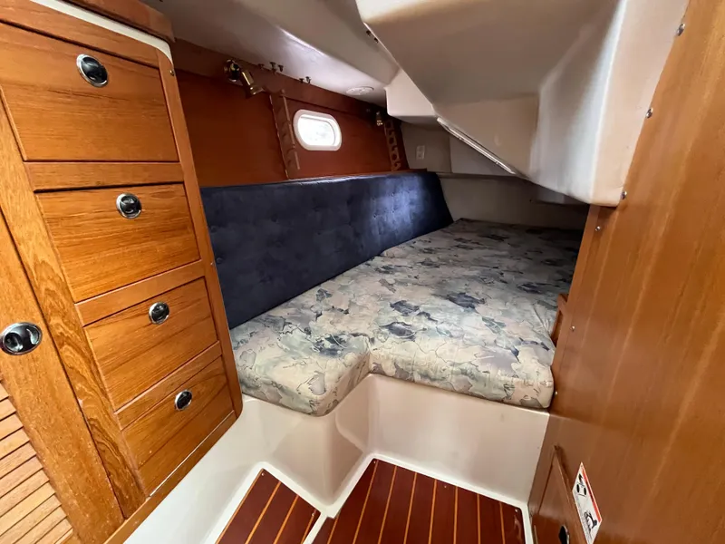 Slide: The Image of Cozy cabin interior of 2000 Catalina 36 Mk II sailboat with wooden cabinetry. - 23