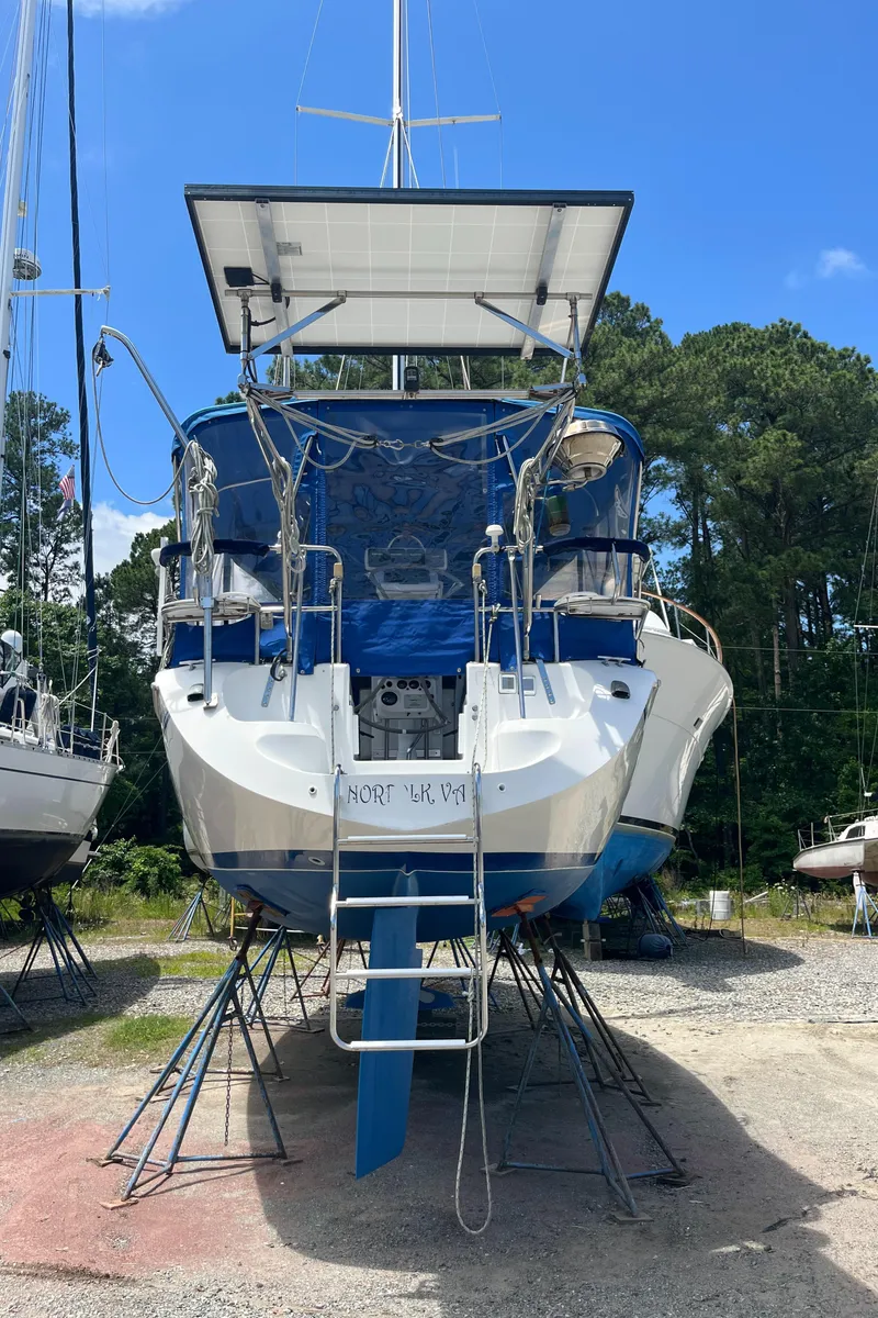 Slide: The Image of Catalina 36 Mk II sailboat, 2000 model, on dry dock with blue sky background. - 4