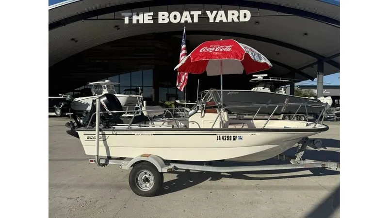 Slide: The Image of 2007 Boston Whaler 150 Montauk boat on trailer at The Boat Yard. - 10