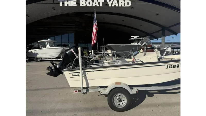 Slide: The Image of 2007 Boston Whaler 150 Montauk boat on trailer at The Boat Yard. - 12