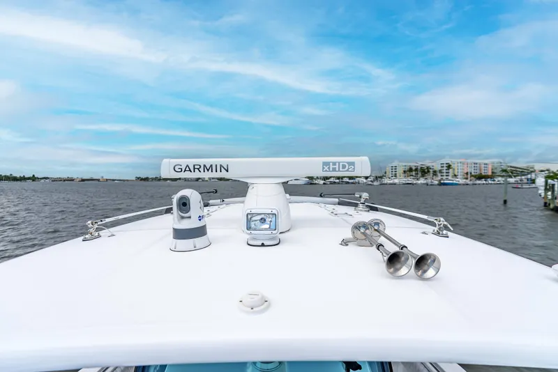 Slide: The Image of 2024 HCB 42 Lujo boat with Garmin xHD2 radar on open water. - 12