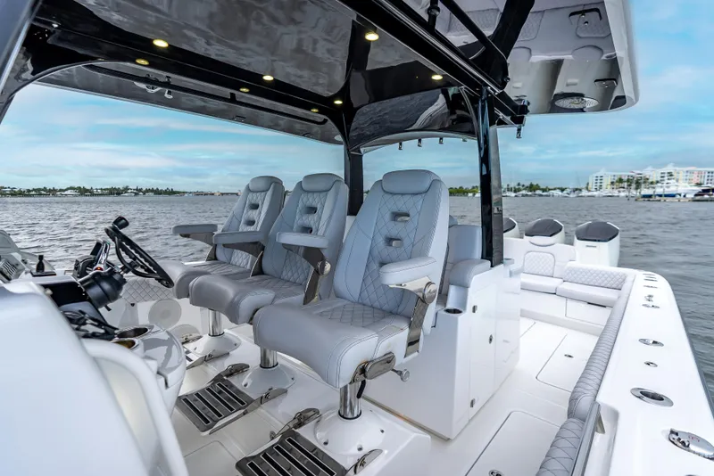 Slide: The Image of Luxury interior of 2024 HCB 42 Lujo boat with plush seating and modern design. - 14