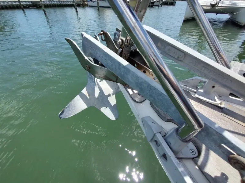 Slide: The Image of Anchor on 1982 Ta Shing Tatoosh 42 sailboat, docked in marina waters. - 10