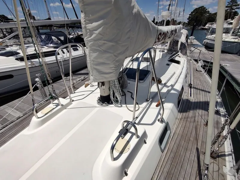 Slide: The Image of 1982 Ta Shing Tatoosh 42 sailboat docked, showcasing deck and rigging details. - 15