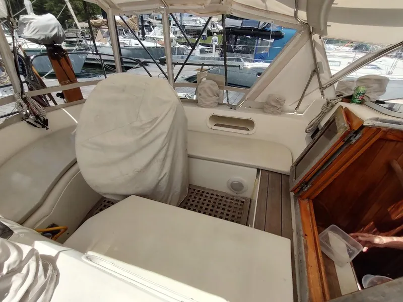 Slide: The Image of Cockpit of 1982 Ta Shing Tatoosh 42 sailboat, featuring covered helm and wooden accents. - 20