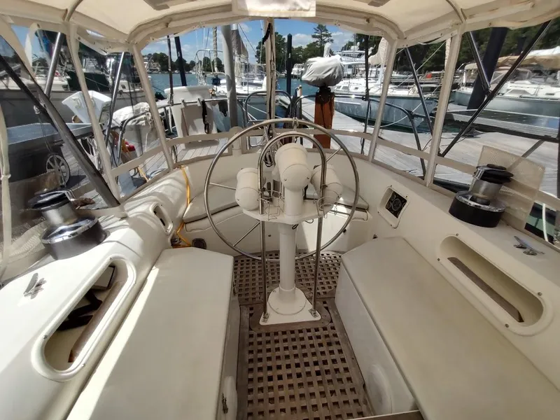 Slide: The Image of Cockpit of 1982 Ta Shing Tatoosh 42 sailboat with steering wheel and seating. - 21