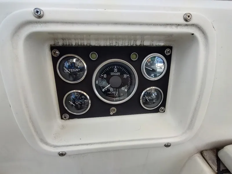 Slide: The Image of Instrument panel of a 1982 Ta Shing Tatoosh 42 sailboat, featuring gauges and dials. - 29