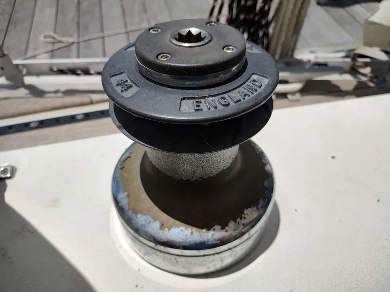 Slide: The Image of Winch on 1982 Ta Shing Tatoosh 42 sailboat deck, marked "England." - 32