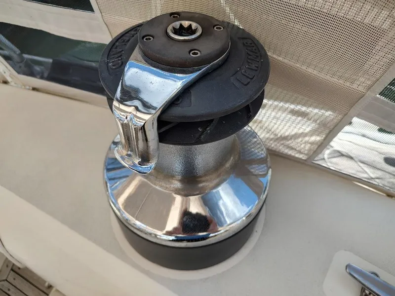 Slide: The Image of Winch on 1982 Ta Shing Tatoosh 42 sailboat, featuring chrome and black components. - 34