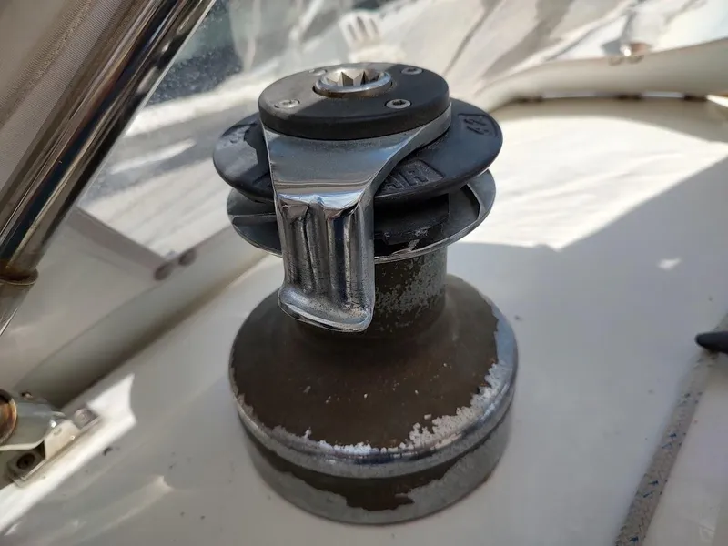 Slide: The Image of Winch on 1982 Ta Shing Tatoosh 42 sailboat deck, showing wear and patina. - 36