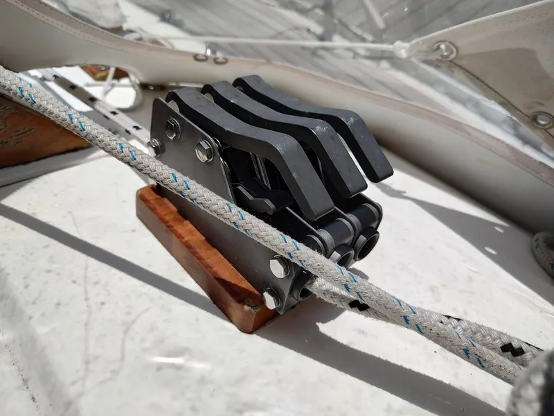 Slide: The Image of Close-up of a rope clutch on a 1982 Ta Shing Tatoosh 42 sailboat deck. - 39