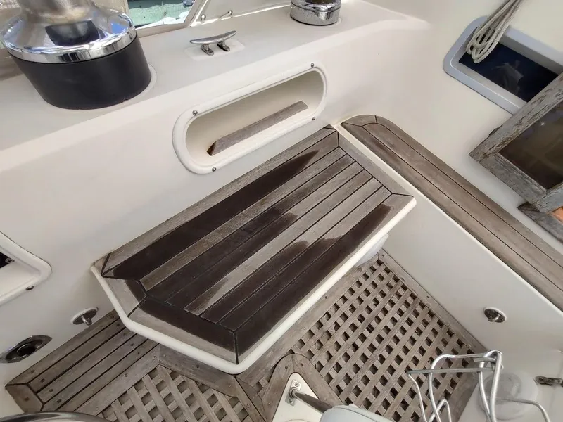 Slide: The Image of Cockpit of 1982 Ta Shing Tatoosh 42 sailboat with wooden seating and flooring. - 47