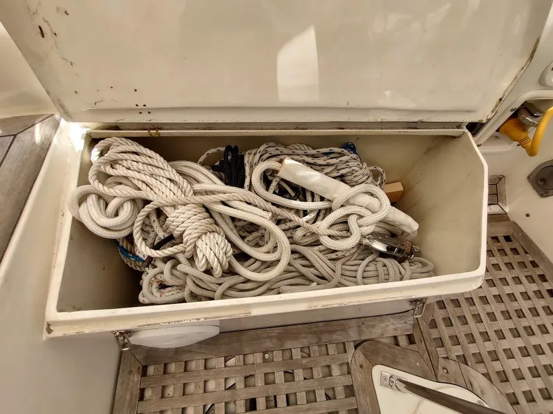 Slide: The Image of Storage compartment with ropes on a 1982 Ta Shing Tatoosh 42 sailboat. - 49
