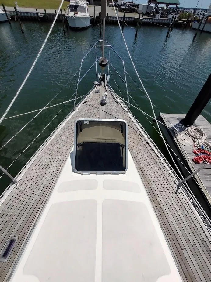 Slide: The Image of 1982 Ta Shing Tatoosh 42 sailboat deck view at marina. - 7