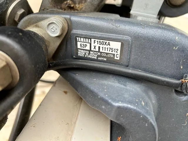 Slide: The Image of Yamaha F150XA engine label on 2013 Grady-White Fisherman 180 boat. - 12