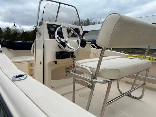 Slide: The Image of 2013 Grady-White Fisherman 180 boat interior with steering console and seating. - 13