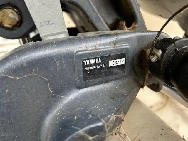 Slide: The Image of Yamaha engine part with manufacturing date 03/12 on a 2013 Grady-White Fisherman 180 boat. - 6