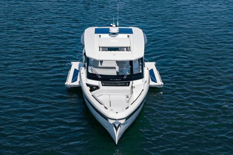 Slide: The Image of 2025 Saxdor 400 GTO yacht on open water, aerial view. - 10