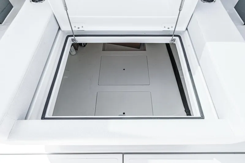 Slide: The Image of Open storage compartment on 2025 Saxdor 400 GTO boat. - 25