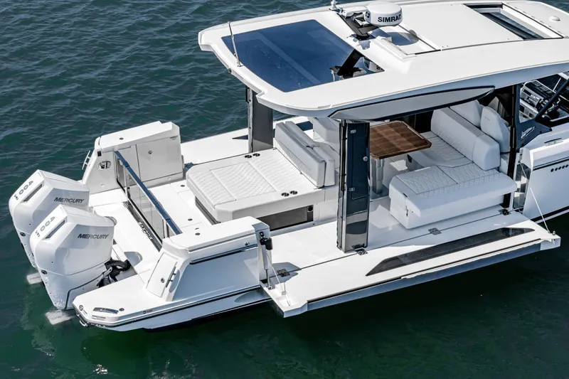 Slide: The Image of Saxdor 400 GTO 2025 luxury boat with twin Mercury engines, spacious deck, and modern seating. - 26