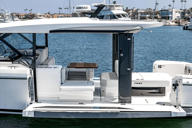 Slide: The Image of 2025 Saxdor 400 GTO luxury yacht with sleek design, docked in a marina. - 37