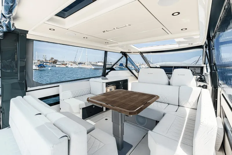 Slide: The Image of Luxurious interior of 2025 Saxdor 400 GTO yacht with elegant seating and table. - 39