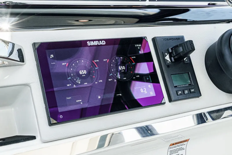 Slide: The Image of Dashboard of 2025 Saxdor 400 GTO featuring Simrad display and controls. - 45