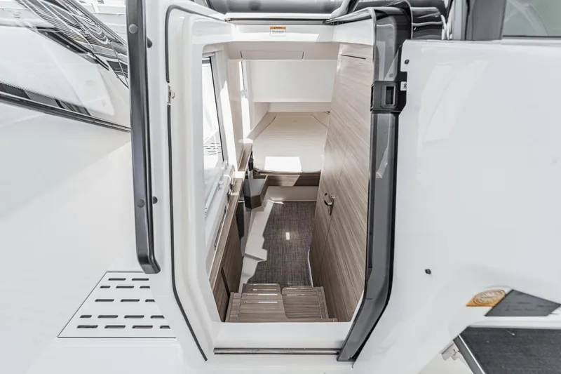 Slide: The Image of Interior view of 2025 Saxdor 400 GTO yacht, showcasing modern cabin entrance. - 47