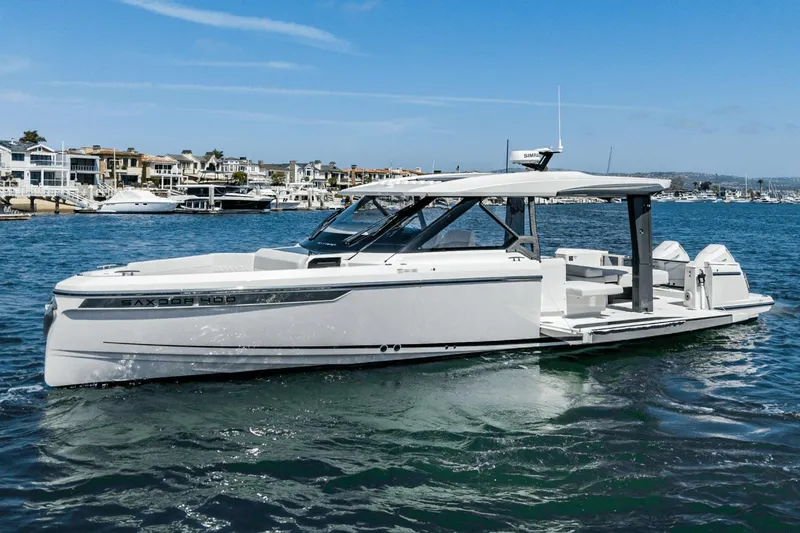 Slide: The Image of 2025 Saxdor 400 GTO luxury boat on water, showcasing sleek design and modern features. - 7