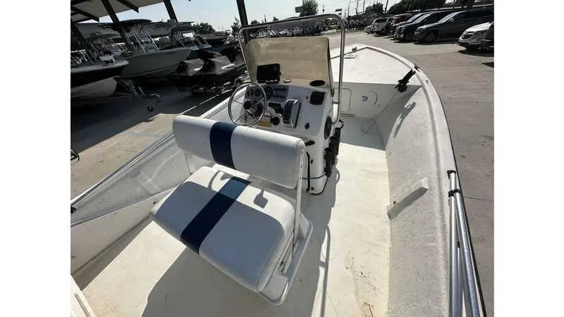 Slide: The Image of 2009 Trophy 181 Bay boat interior with steering console and seating. - 14
