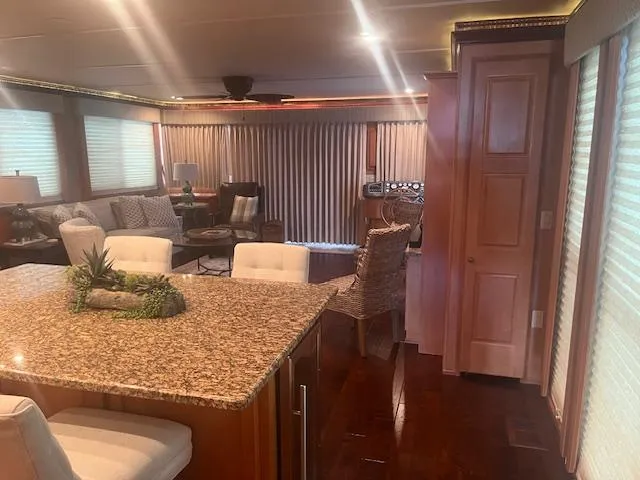 Slide: The Image of Luxurious interior of a 2009 Horizon 18 x 85 houseboat with modern furnishings. - 16