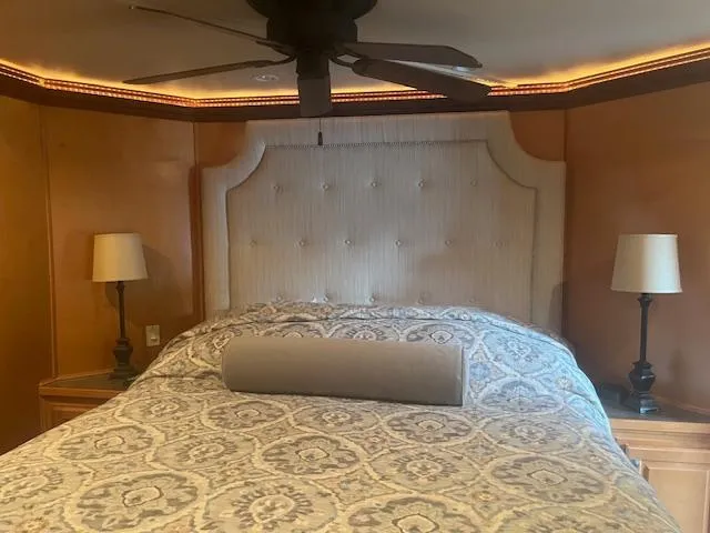 Slide: The Image of Luxurious bedroom interior of 2009 Horizon 18 x 85 Houseboat with elegant bedding and lighting. - 33