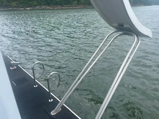 Slide: The Image of 2009 Horizon 18 x 85 Houseboat with slide and water access ladder. - 39