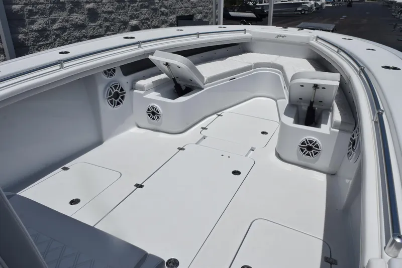 Slide: The Image of 2024 Yellowfin 36 Offshore boat interior with spacious deck and storage compartments. - 15
