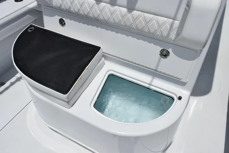 Slide: The Image of 2024 Yellowfin 36 Offshore boat seating with storage and livewell. - 21