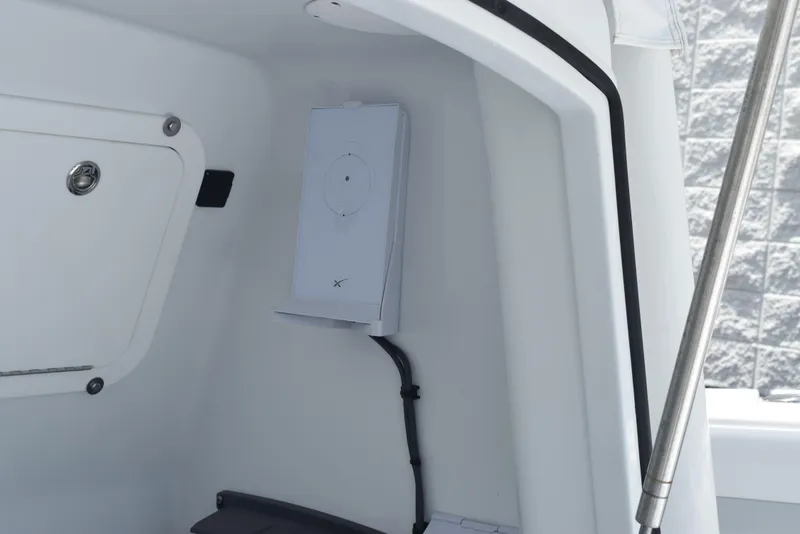Slide: The Image of 2024 Yellowfin 36 Offshore interior detail with mounted electronic device. - 24