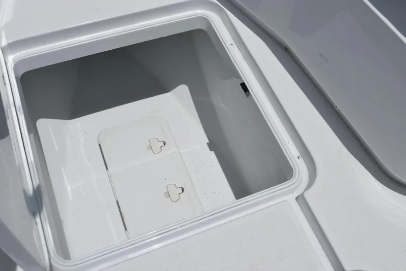 Slide: The Image of Storage compartment on 2024 Yellowfin 36 Offshore boat, open and empty. - 26