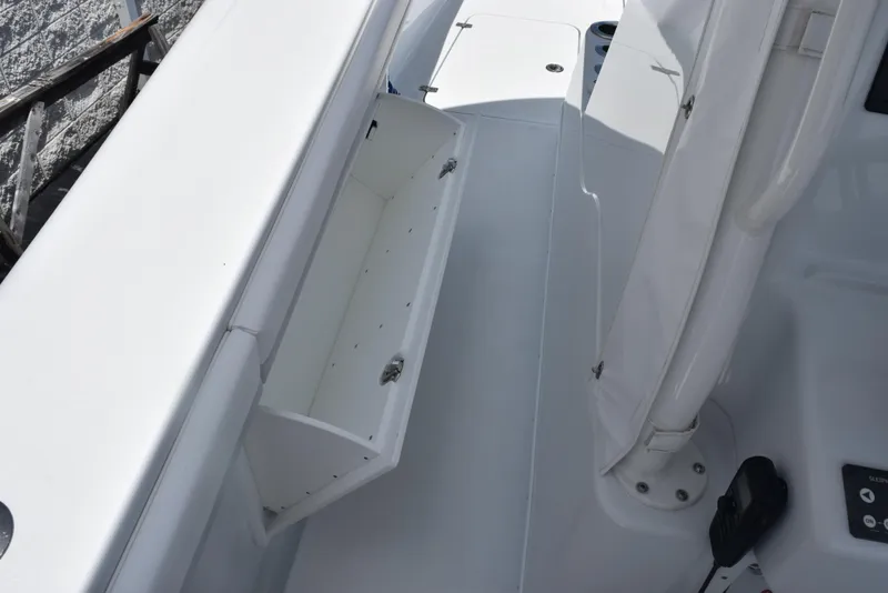 Slide: The Image of 2024 Yellowfin 36 Offshore boat deck with storage compartment. - 32